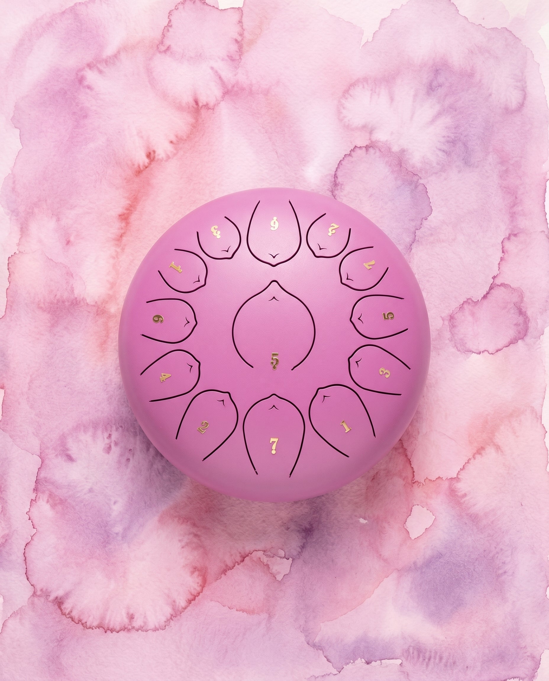 `Orchid Pink Ethereal 12-inch steel tongue drum with numbered notes beneath an ethereal water color sky.