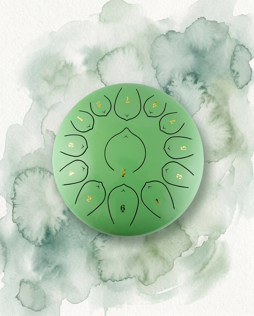 `Sage Green Ethereal 12-inch steel tongue drum with numbered notes beneath an ethereal water color sky.