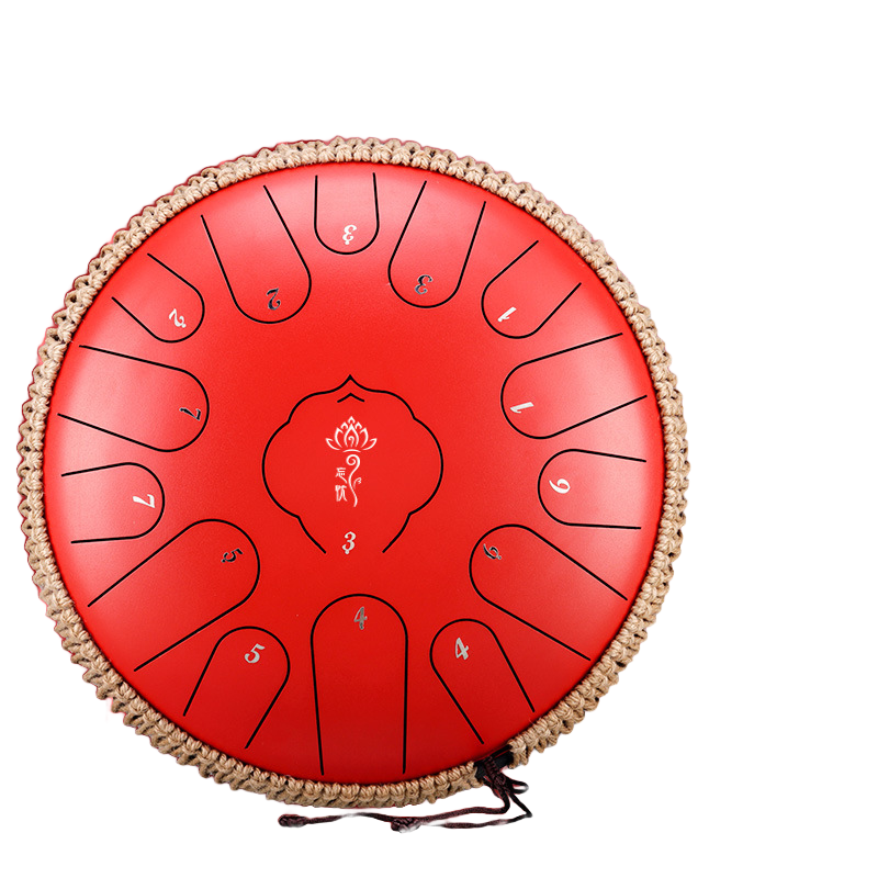 A red steel tongue drum with numbered metal tongues and a braided natural-fiber rim, shown on a plain white background.