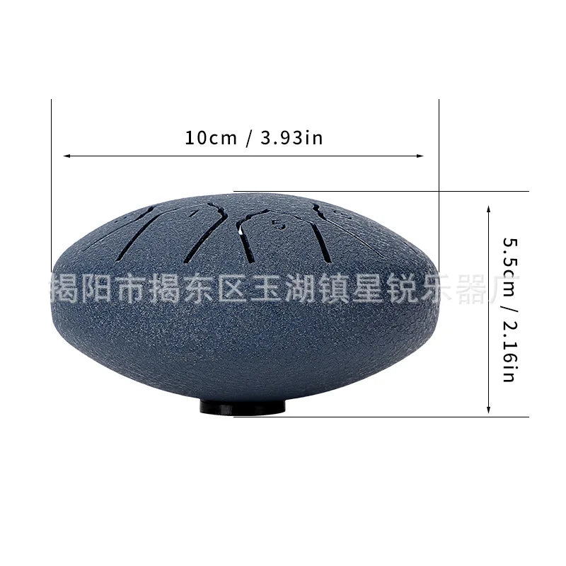 A handpan-style drum shown with dimension lines indicating a width of 10cm (3.93in) and a height of 5.